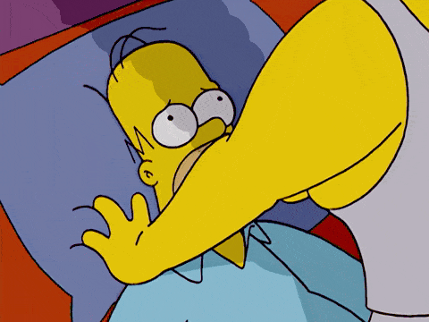 SIMPSONS MARGE LEANING OVER HOMER SIGNIFYING SEXUAL ABUSE