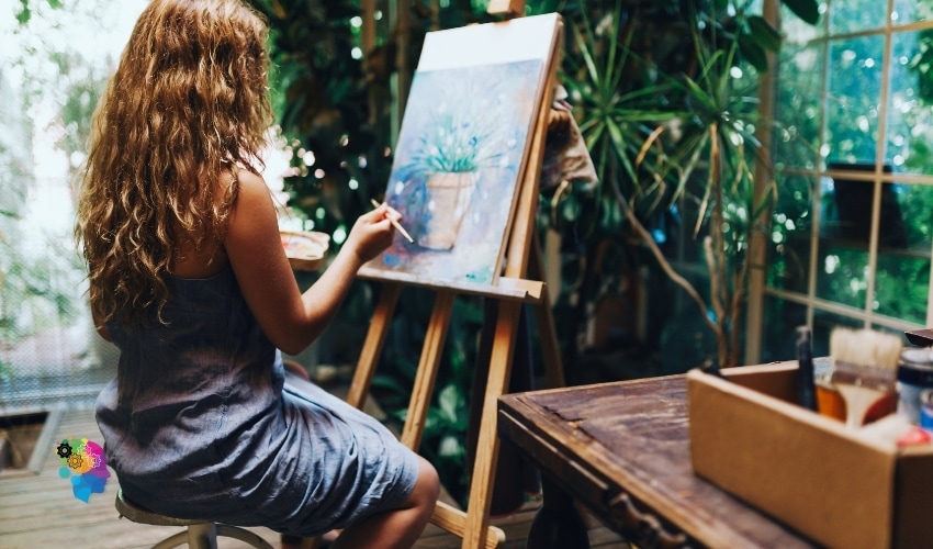 person actively engaging in painting, in a post about how to get over someone you never dated