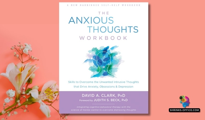 Cover of 'The Anxious Thoughts Workbook' by David A. Clark, Ph.D., with a blue and green watercolor brain illustration on a peach background with white lilies.