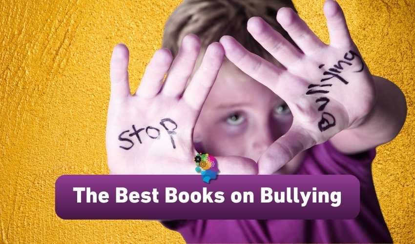 A child's hands held up with the words 'stop' and 'bullying' written on them, set against a yellow background.